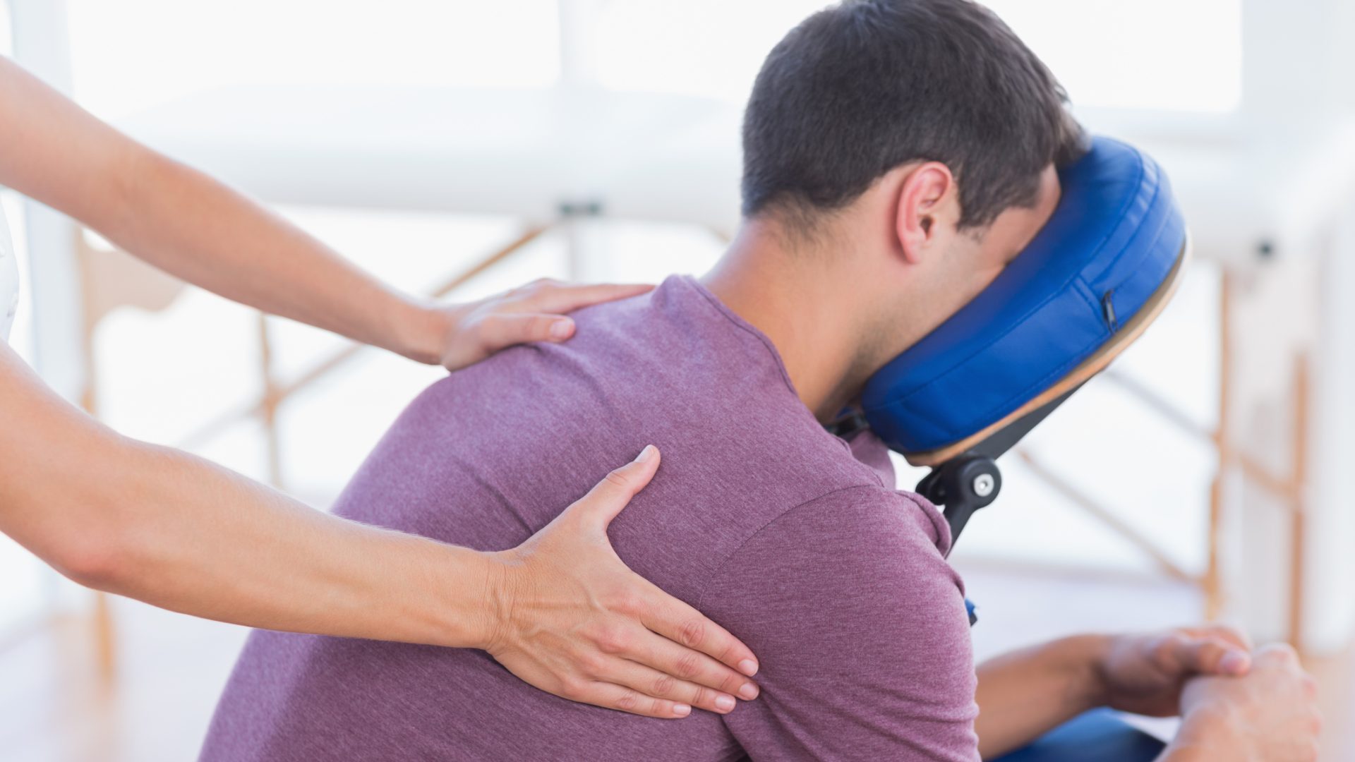 Man having back massage in medical office